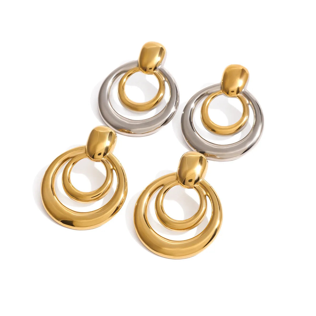 Gold double-layer hollow stud earrings with round 2.5cm diameter geometry and 0.5cm spacing between layers