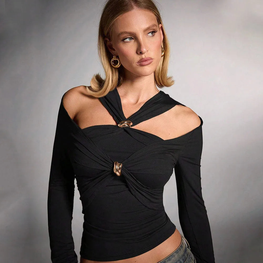 Black women's halterneck slim-fit top with long sleeves on a model.