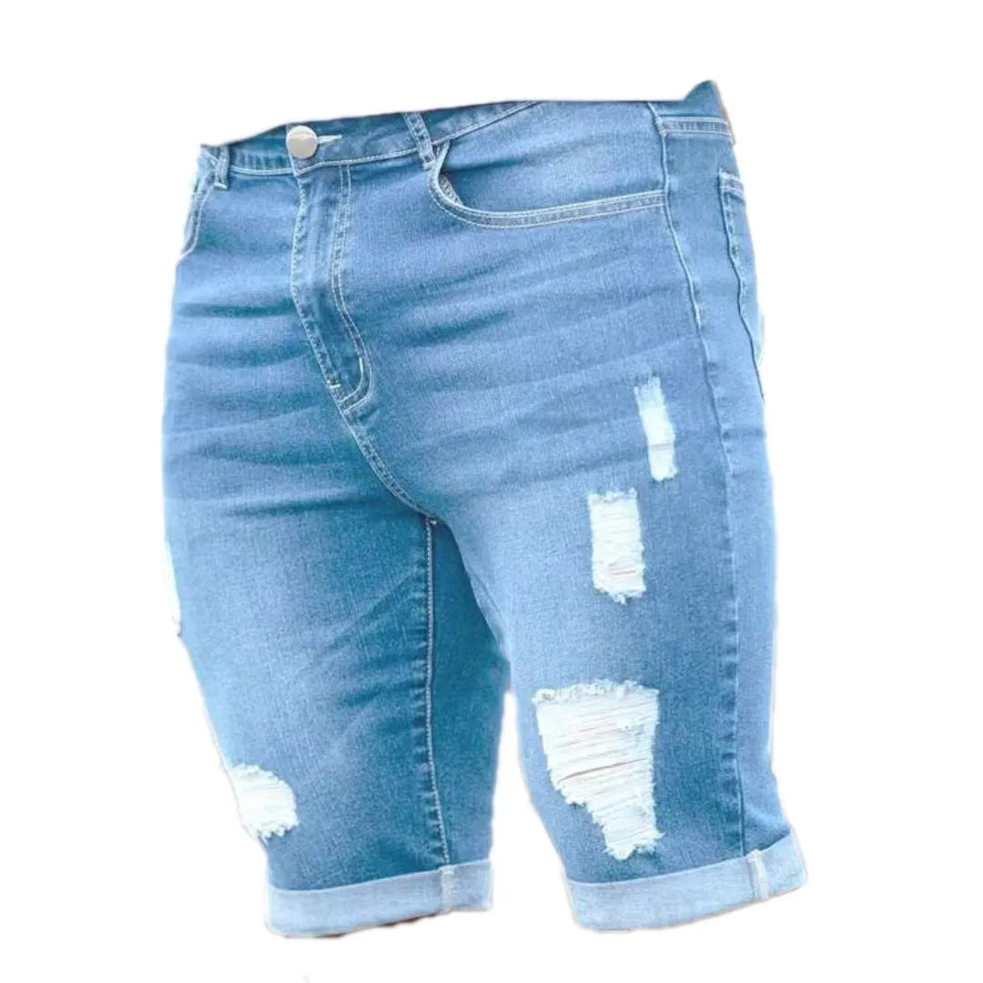 Sky blue men's denim shorts with manual distressing and multi-hole detailing on straight-leg cut