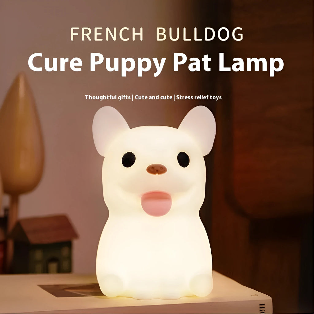 Silicone cartoon bull night light with USB port for charging and dimming controls.