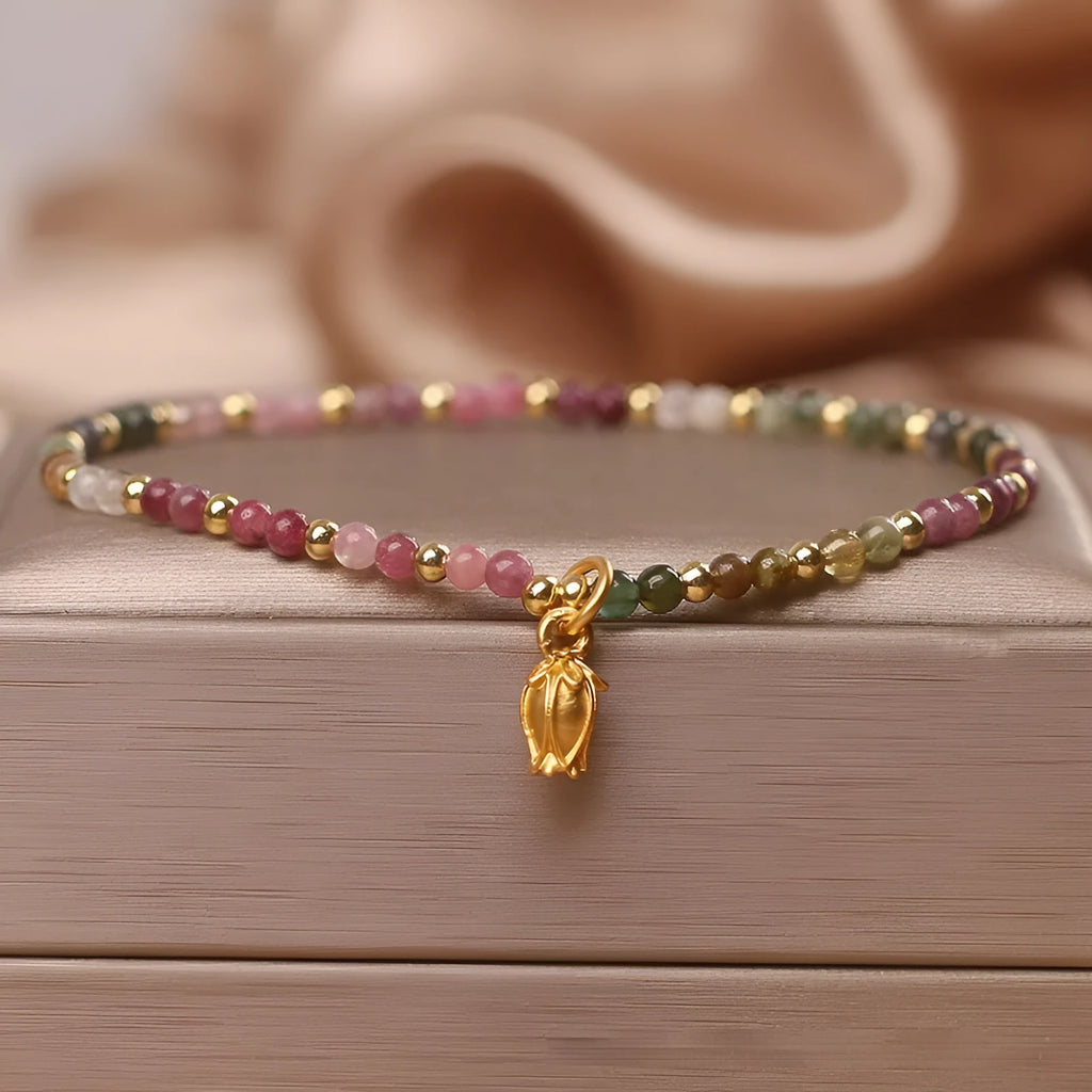 Natural tourmaline beaded adjustable anklet and bracelet set with floral charm detail