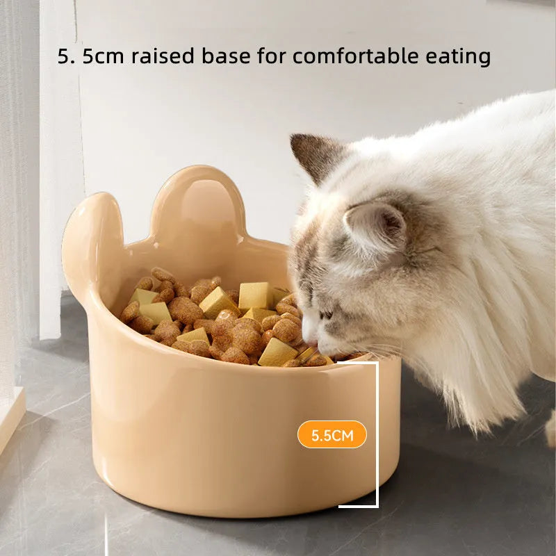 Ceramic pet bowl with neck guard design in white rabbit pattern, shown next to a large brown bear pattern bowl.