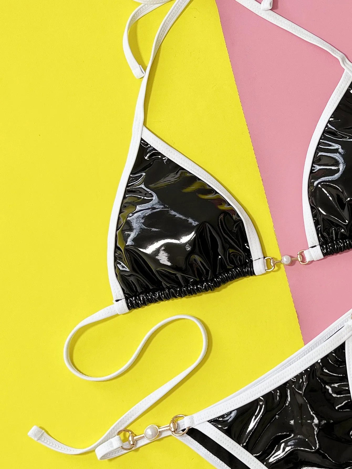 Black solid colour women's bikini set with triangle top and briefs bottoms