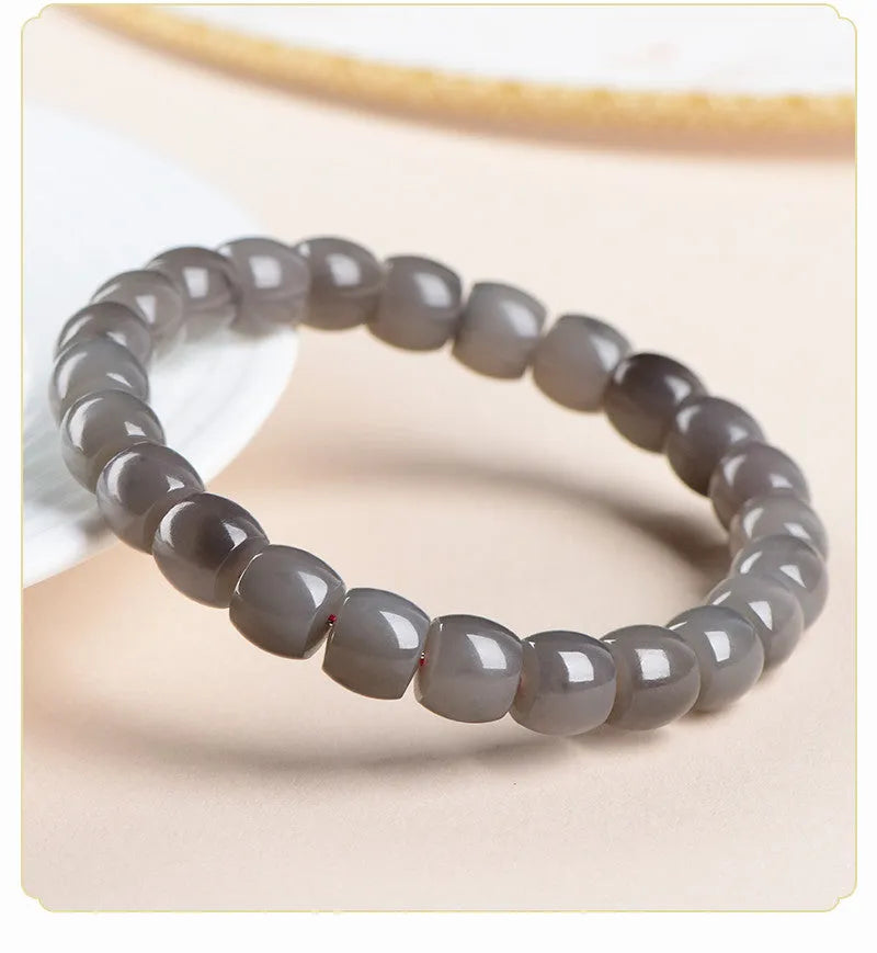 Natural smokey violet Hetian jade straight cut bracelet with 24 beads measuring 8x9mm