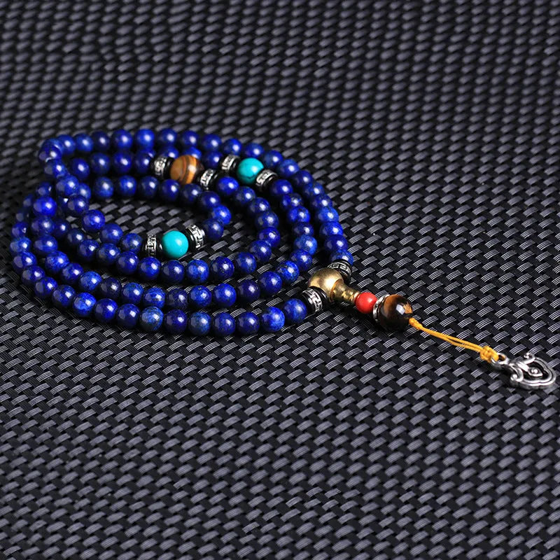Handcrafted blue lapis lazuli 108 bead bracelet with zodiac charm