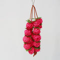 Natural rattan parrot chew toy, 20 cm long, 35 g, with hanger, shown in pink or primary colour for birdcages