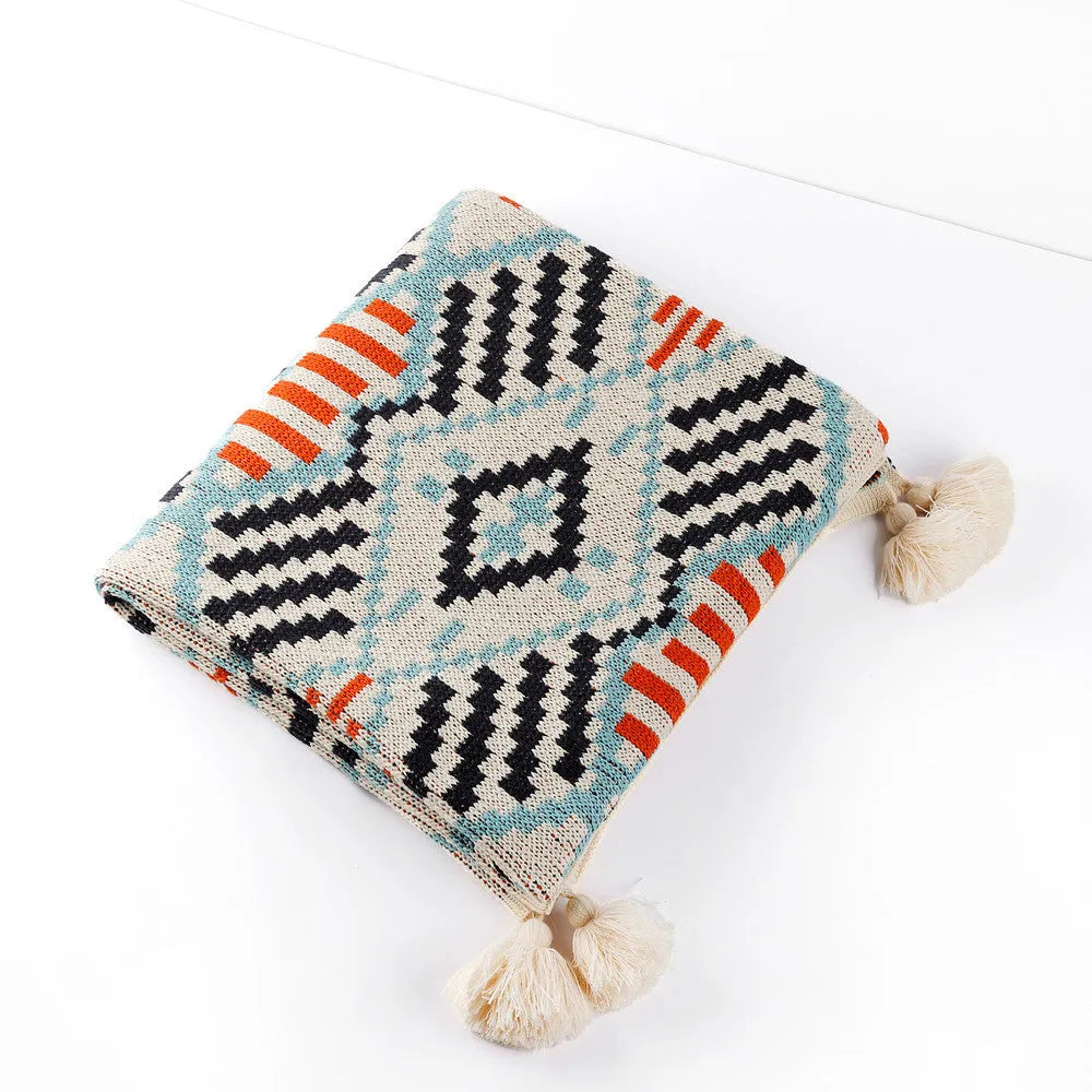 Bohemian sofa cover blanket with tassel trim in geometric pattern, dimensions 130cm width, available in multiple lengths and colours.