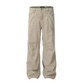 Men's brown straight-leg trousers with high waist and non-ironing cotton fabric on a hanger