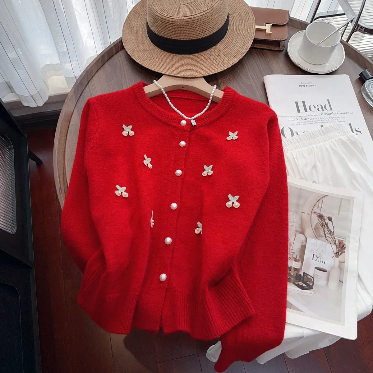 Cashmere blend cardigan with beaded detailing in slim fit silhouette, available in pink, red, white, and blue colours