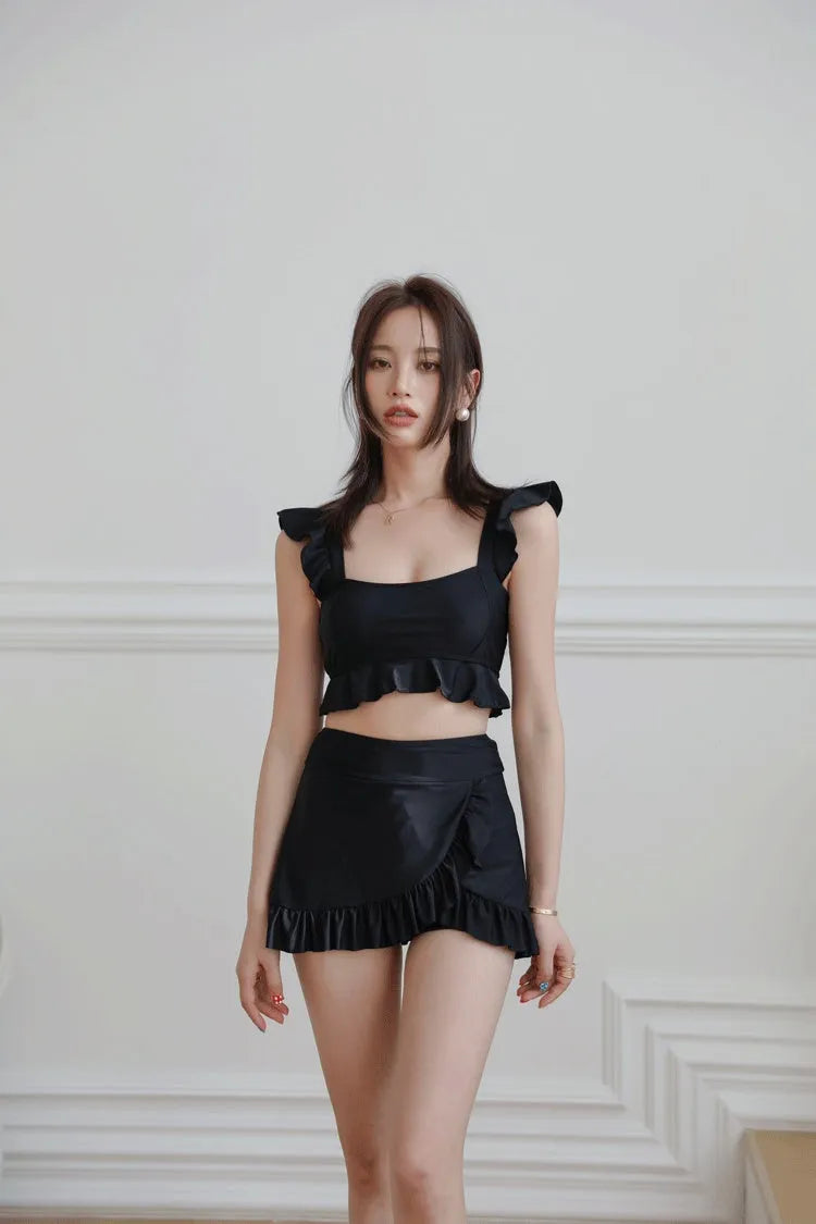 Black nylon swimsuit for women with split brief design