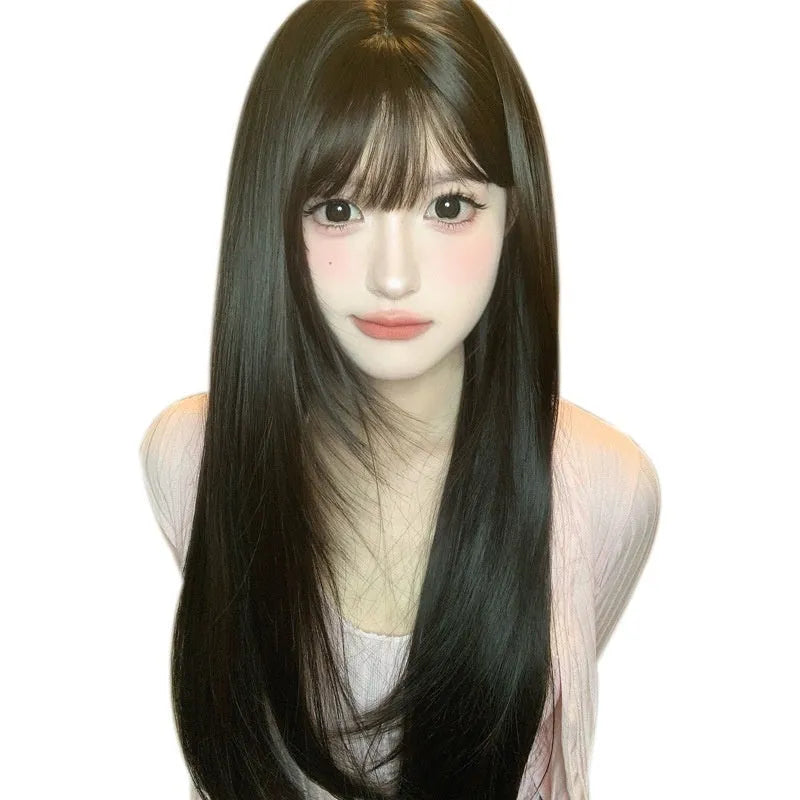 Dark brown women's wig with long straight hair and bangs style on wig head
