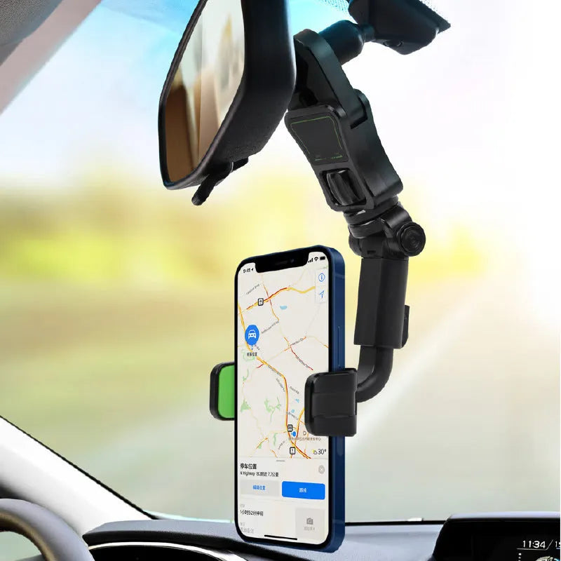 Black and green car phone holder attached to rear view mirror bracket