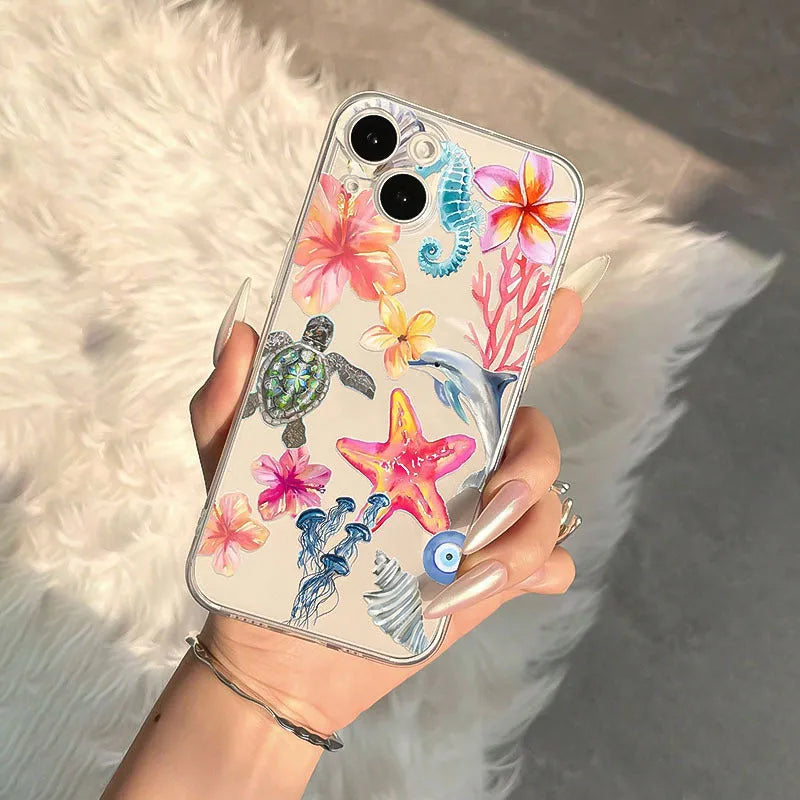 Transparent iPhone case with dolphin turtle design showing anti-fall TPU protection