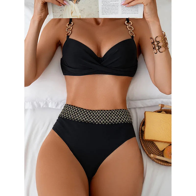 Black women's bikini swimsuit set with sleeveless top and briefs on a neutral background.