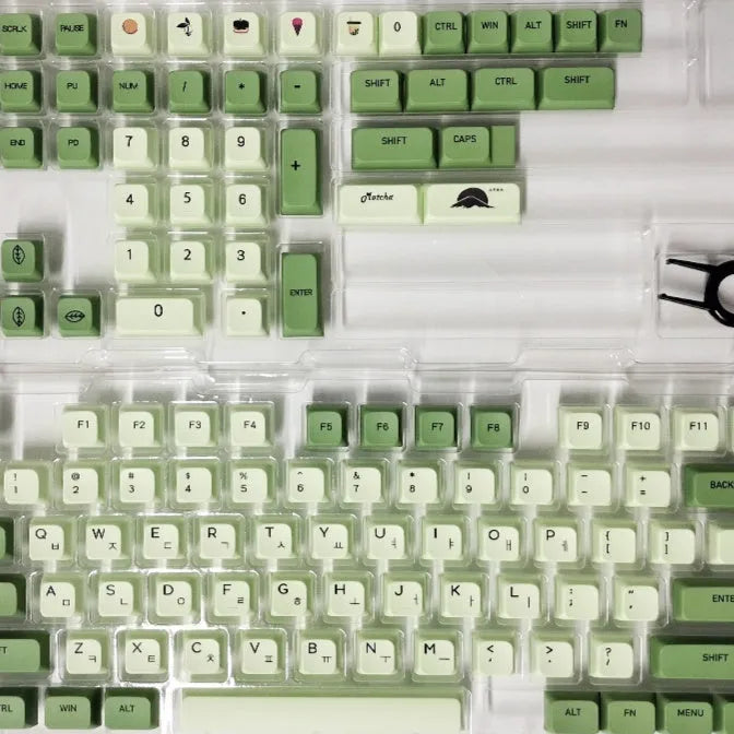 124 Matcha green PBT keycaps with white dye-sublimated legends, arranged in a keyboard layout.