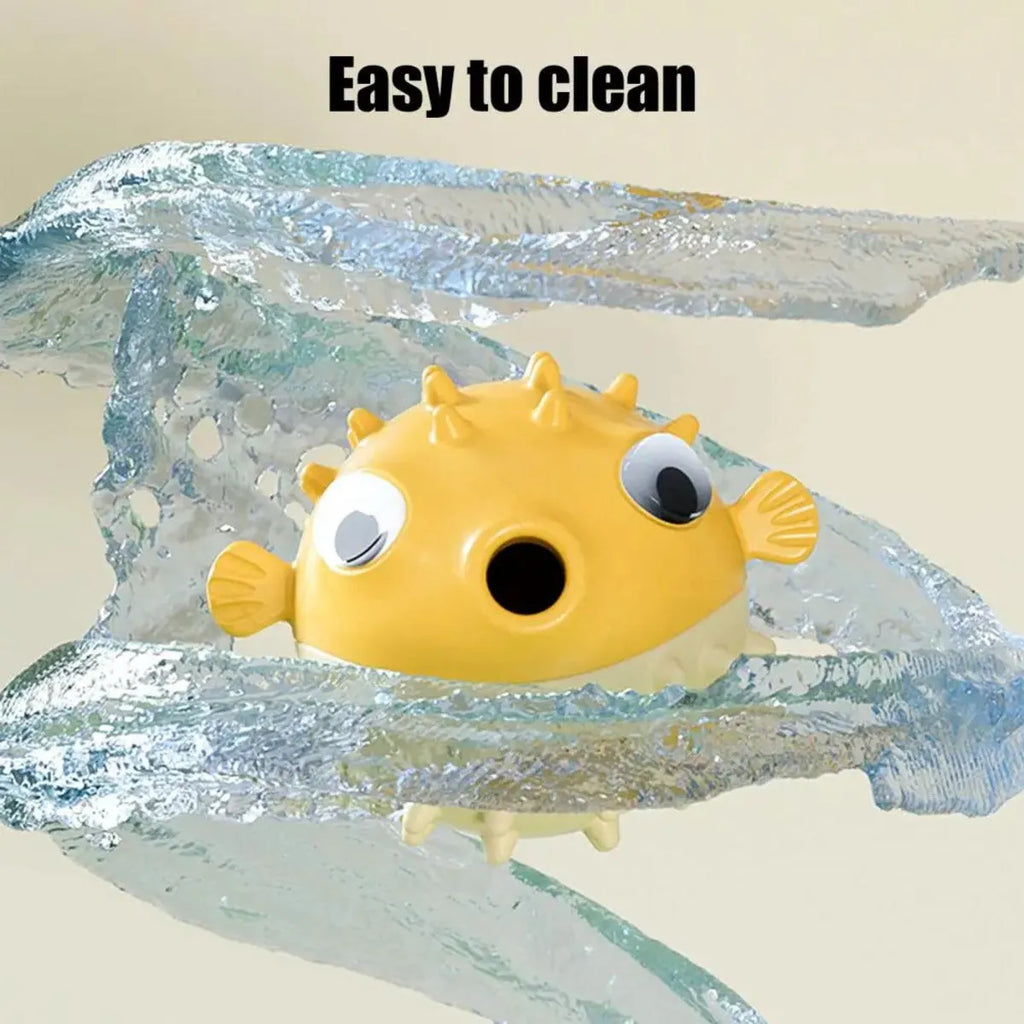 Yellow fish-shaped dog chew toy with textured surface and squeaker, measuring 20cm long