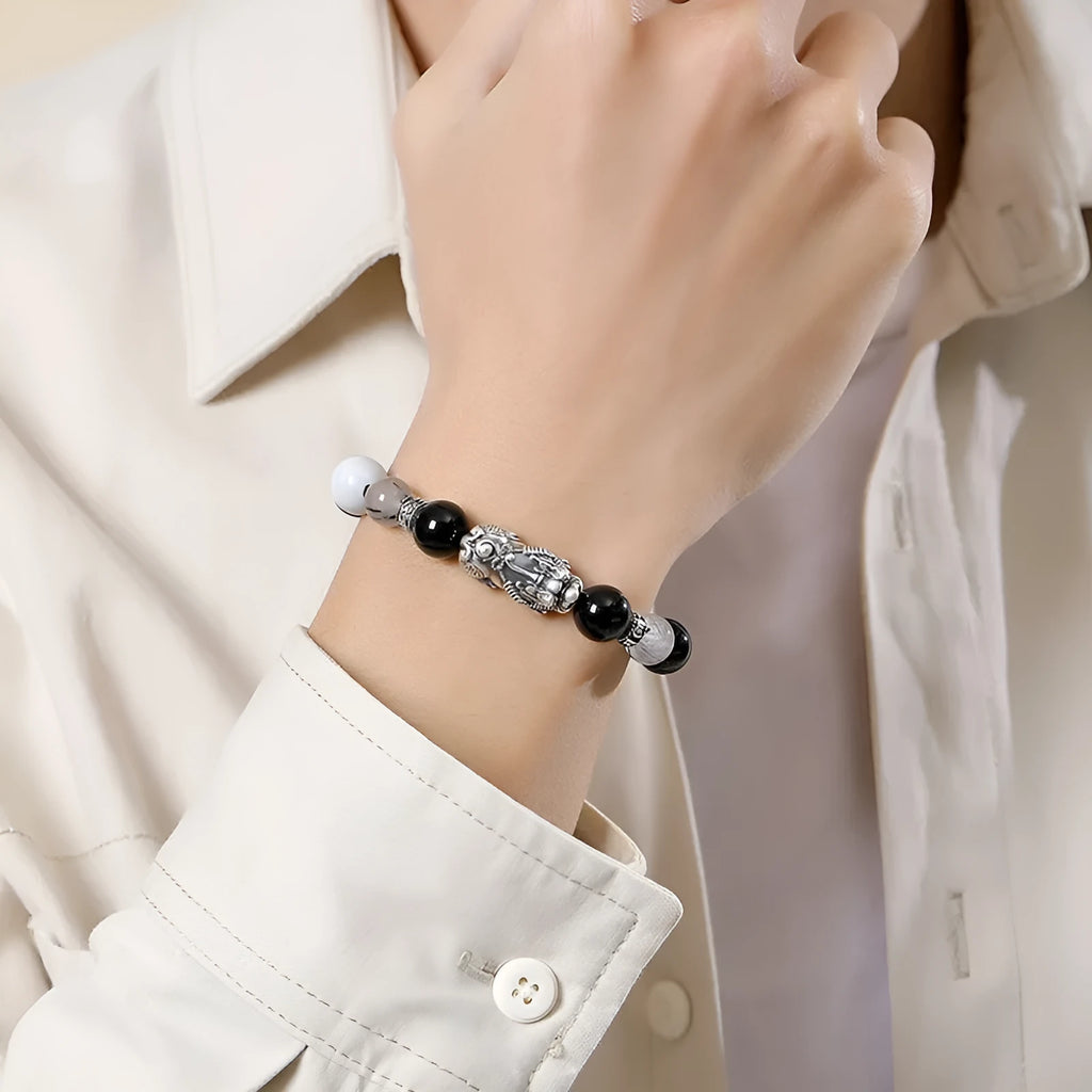 Hand-woven sterling silver couple bracelet with animal tassel decorative elements