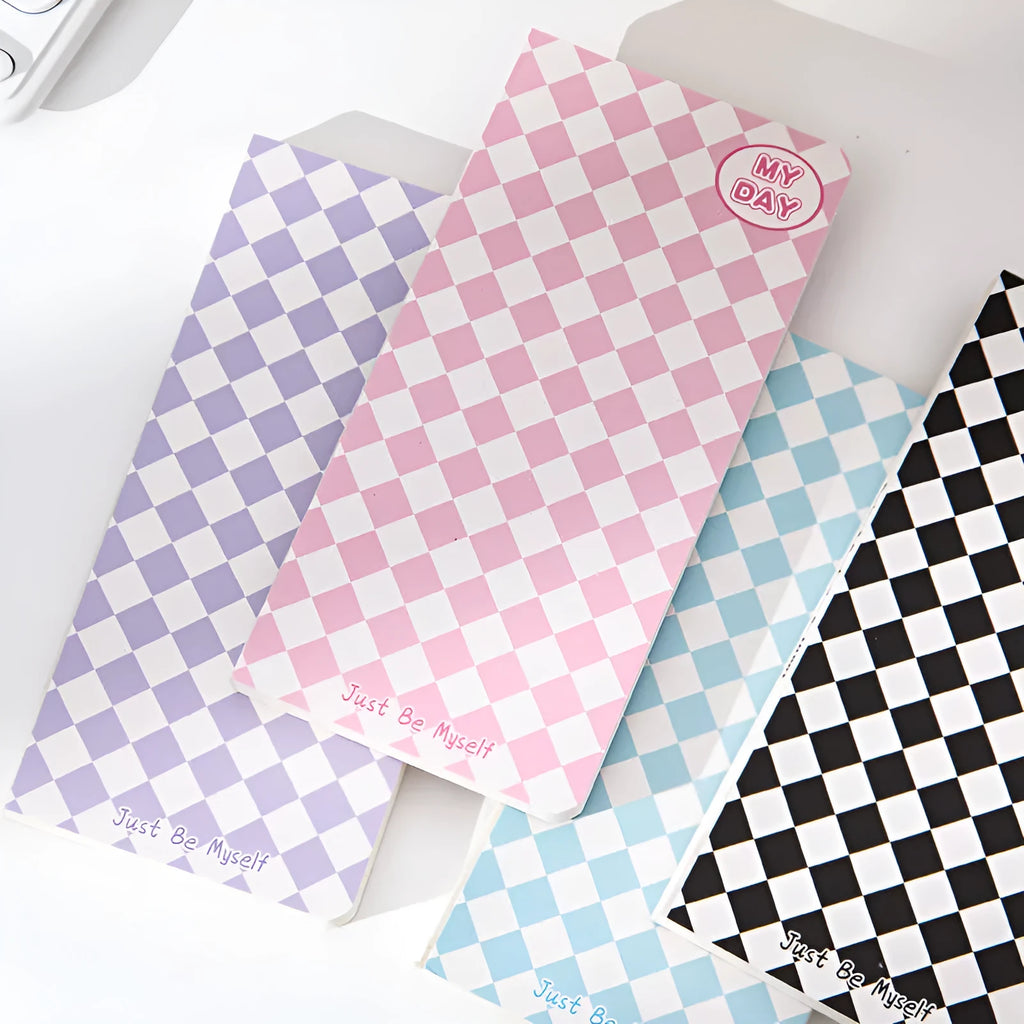 Manual ledger notebook with 100 sheets showing 12 different cover designs including checkerboard and fruit patterns