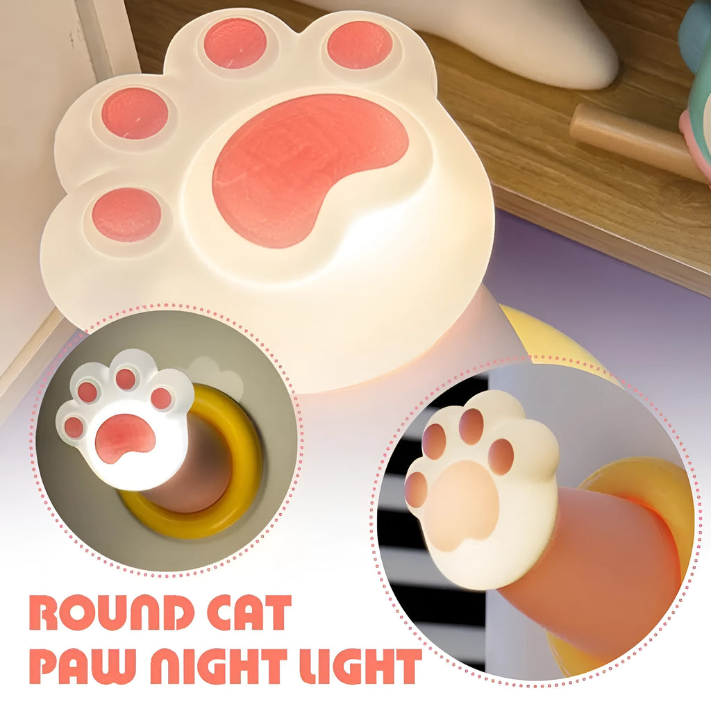White cat paw shaped touch control night light lamp on a wooden nightstand.