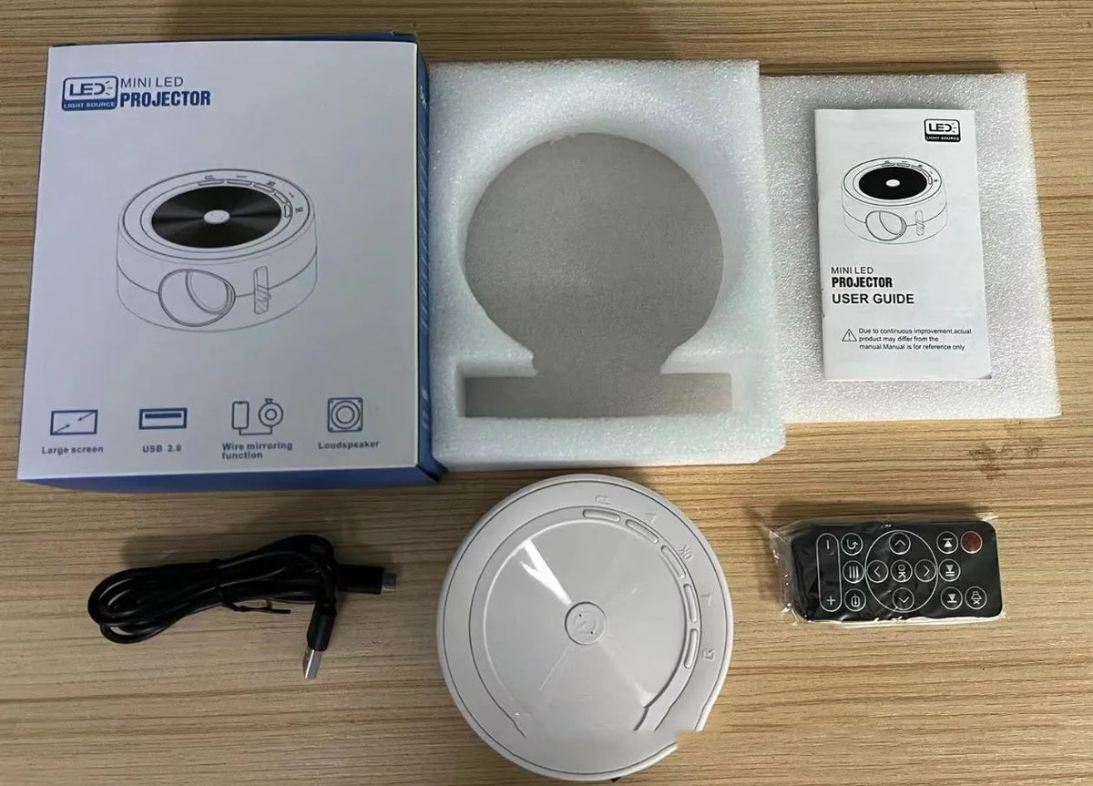 YT200 portable LED projector in black, white, blue and white, or yellow and white colour options