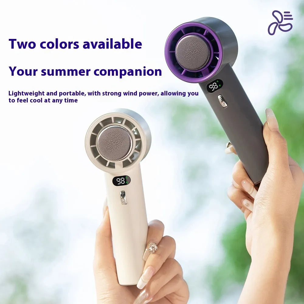 White and grey portable handheld turbo fan with semiconductor cooling and adjustable speeds.