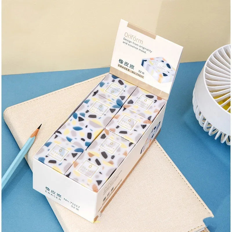 Super Clean Traceless rubber eraser with a brick shape for student stationery.