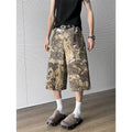 Yellow snake pattern camouflage cropped denim jeans on size chart showing S to 3XL options