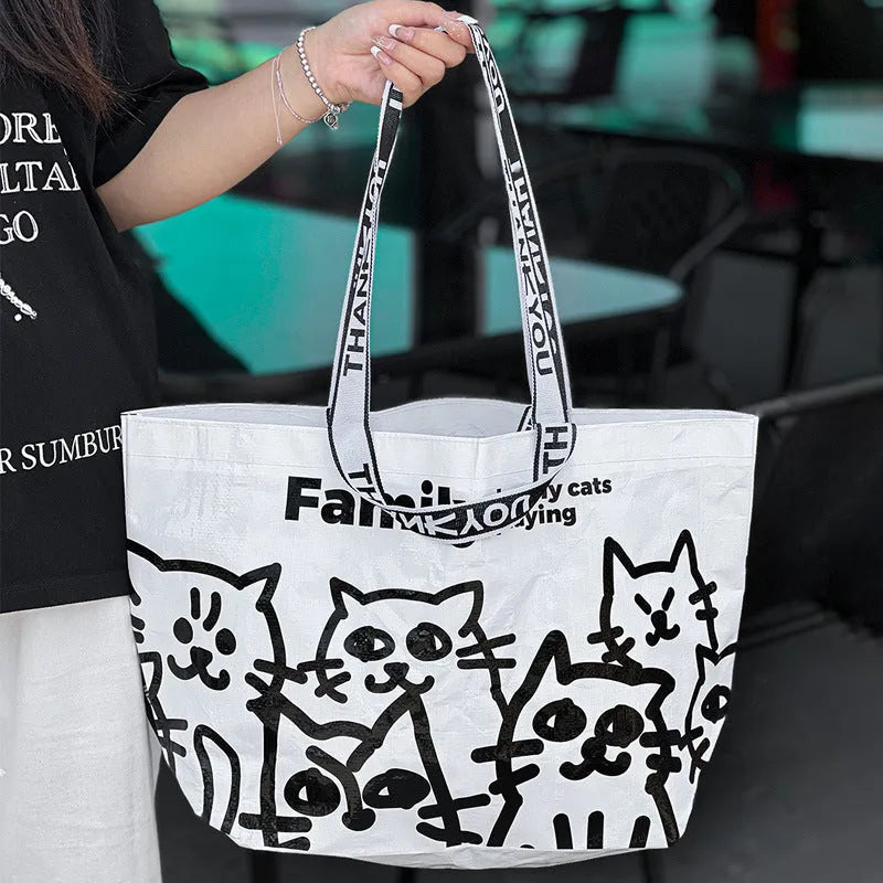 Waterproof woven handbag with snakeskin pattern and colour printing, made from PP fabric for carrying clothing and cosmetics