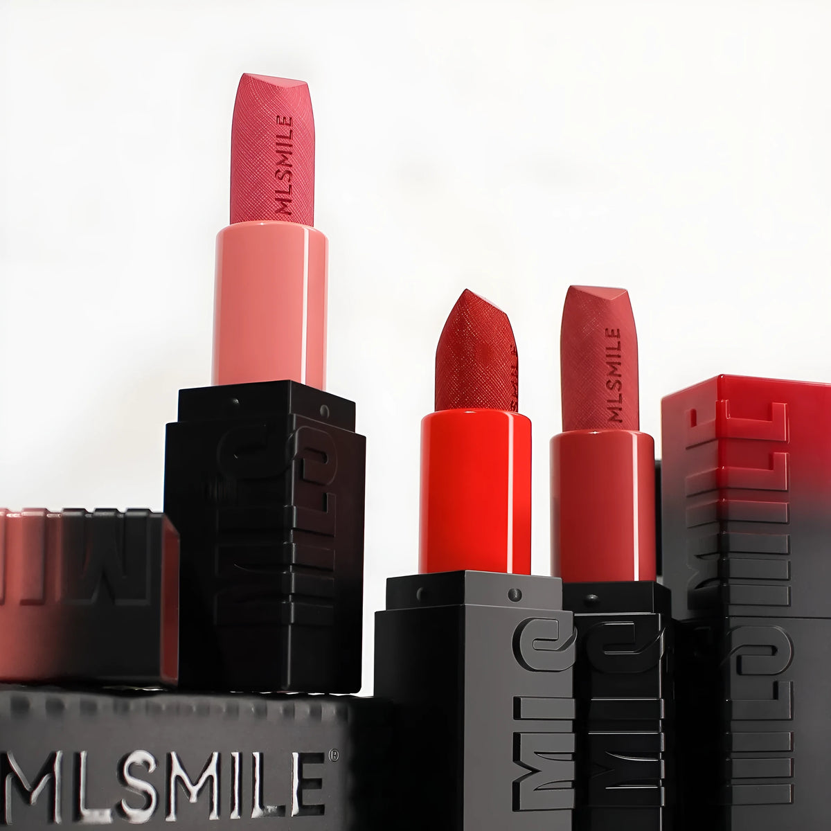 MLSMILE embossed lipstick three-piece set in box showing three 3.6g lipsticks with natural moisturising formula