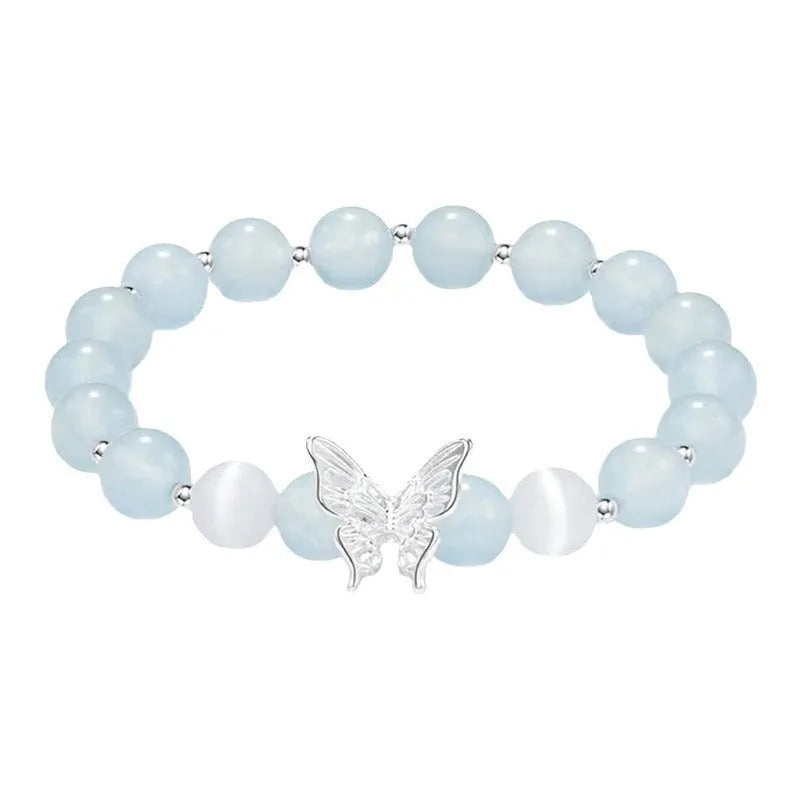 Women's crystal butterfly bracelet with cat eye design in bow shape showing three colour options