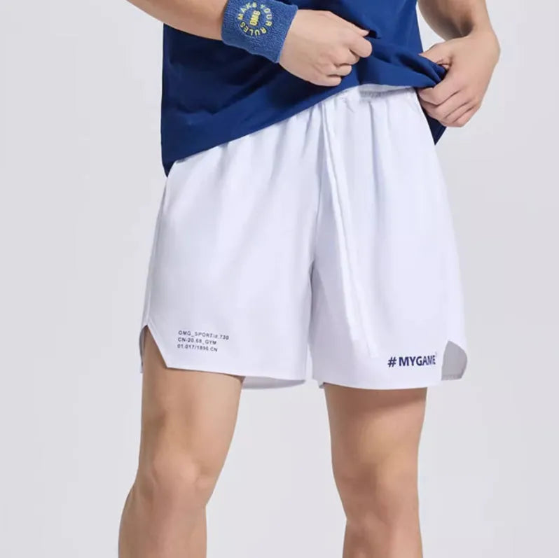 Men's midnight blue training fitness shorts with moisture-wicking fabric on a gym background.