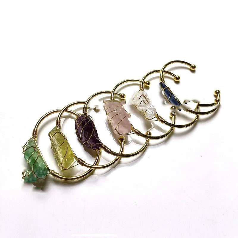 Natural crystal rough stone bracelet with geometric unshaped design and gold winding metal accents