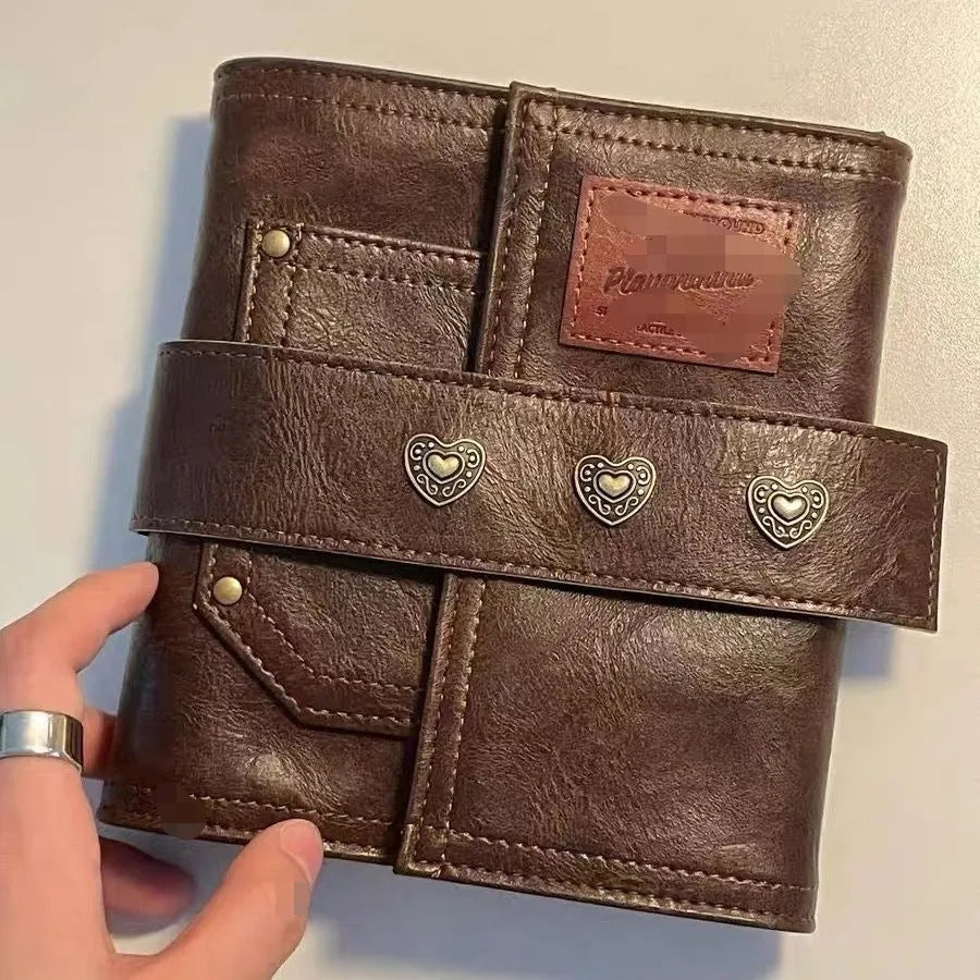 A7 brown PU notebook with loose-leaf binder binding showing 40g raw wood pulp paper inside