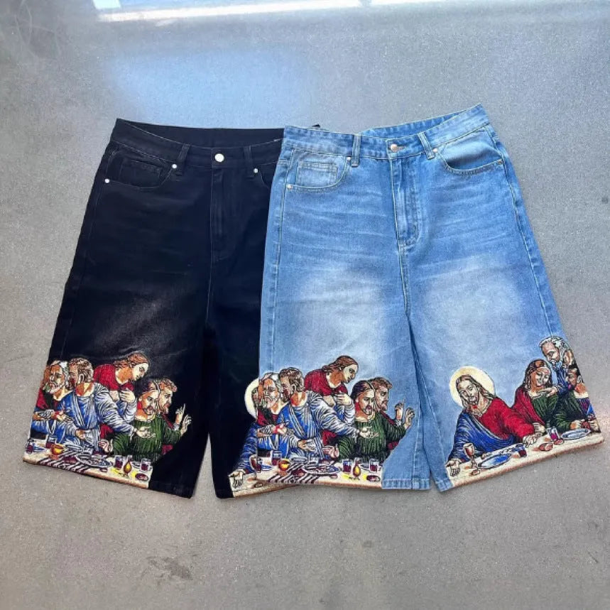 Blue men's cotton shorts with a Jesus design on the back pocket, showing tapered leg.