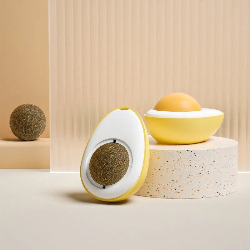 Catnip ball toy with 360-degree rotation mounted on wall, natural catnip filling visible through plush material