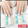 Pack of Korean nail stickers showing cartoon, strawberry, floral, and bow patterns with a nail file.