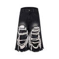 Black cropped wide-leg jeans with mid-high waist, showing loose fit and micro-elastic cotton fabric