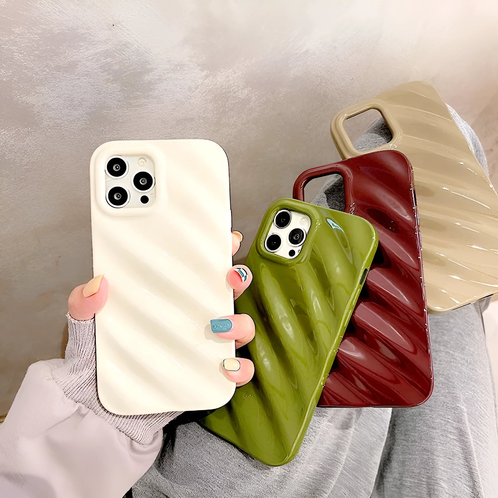 Nordic style pleated silicone iPhone case with laser detailing in silver colour.