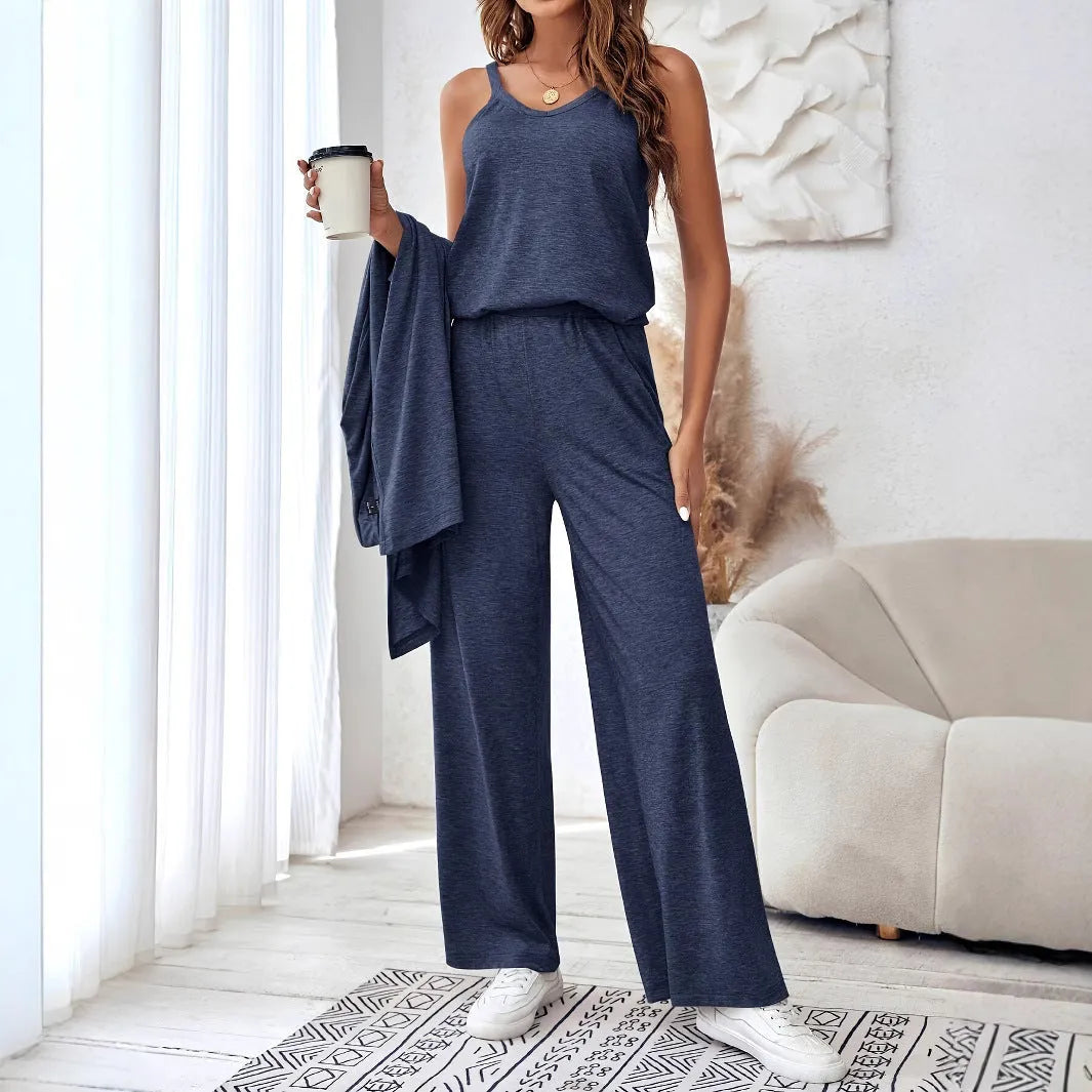 Women's blue polyester casual suit set with trousers, long sleeve top, and suspenders on hanger