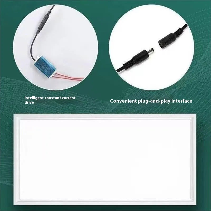A rectangular white embedded ceiling panel light with a flat surface, shown installed flush in a false ceiling.