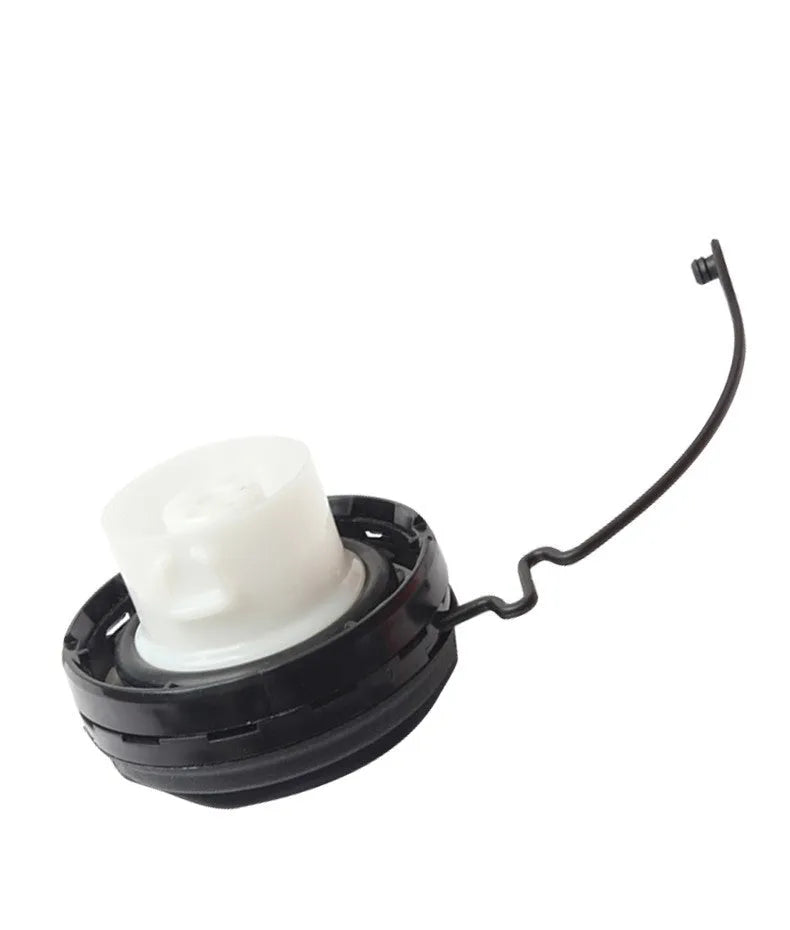 Toyota snap-type fuel tank cap showing 10.5 cm diameter and plastic construction