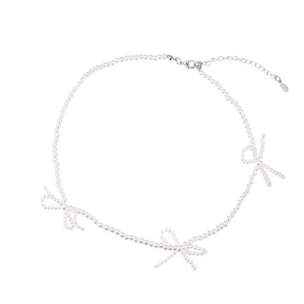 Women's pearl necklace with bow design and adjustable 31-40cm length