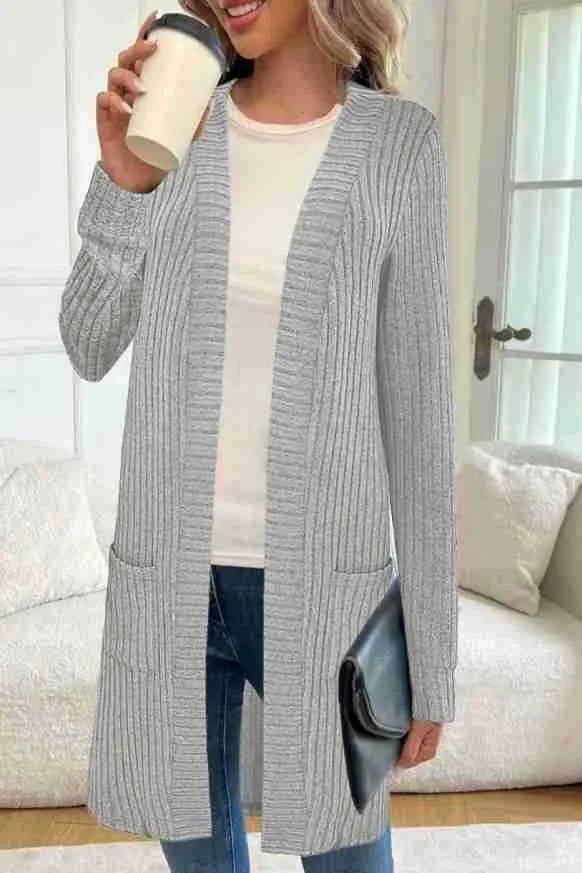 Long sleeve loose pockets knitted cardigan jacket in black colour showing front cardigan design and pocket details