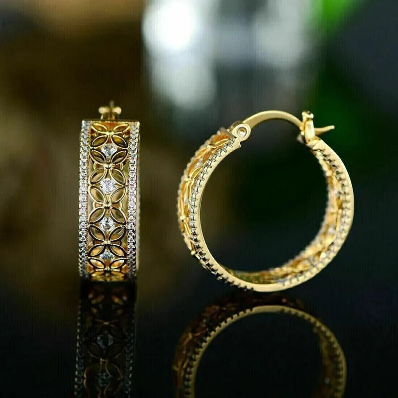 Geometric copper clip earrings with horse eye flower butterfly design in yellow gold colour