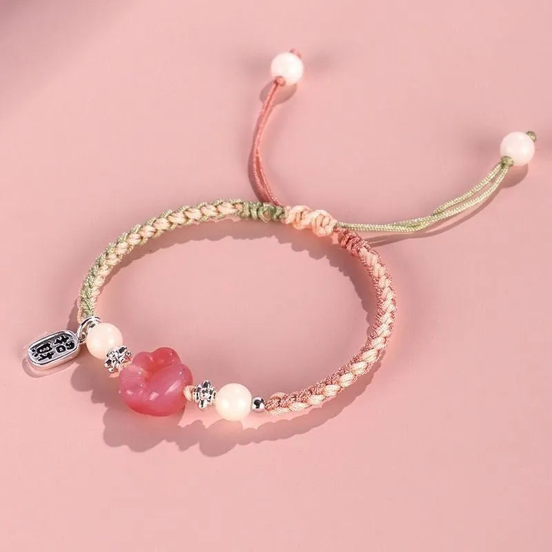 Red cat's paw couple bracelet with woven glass beads in handcrafted pastoral design
