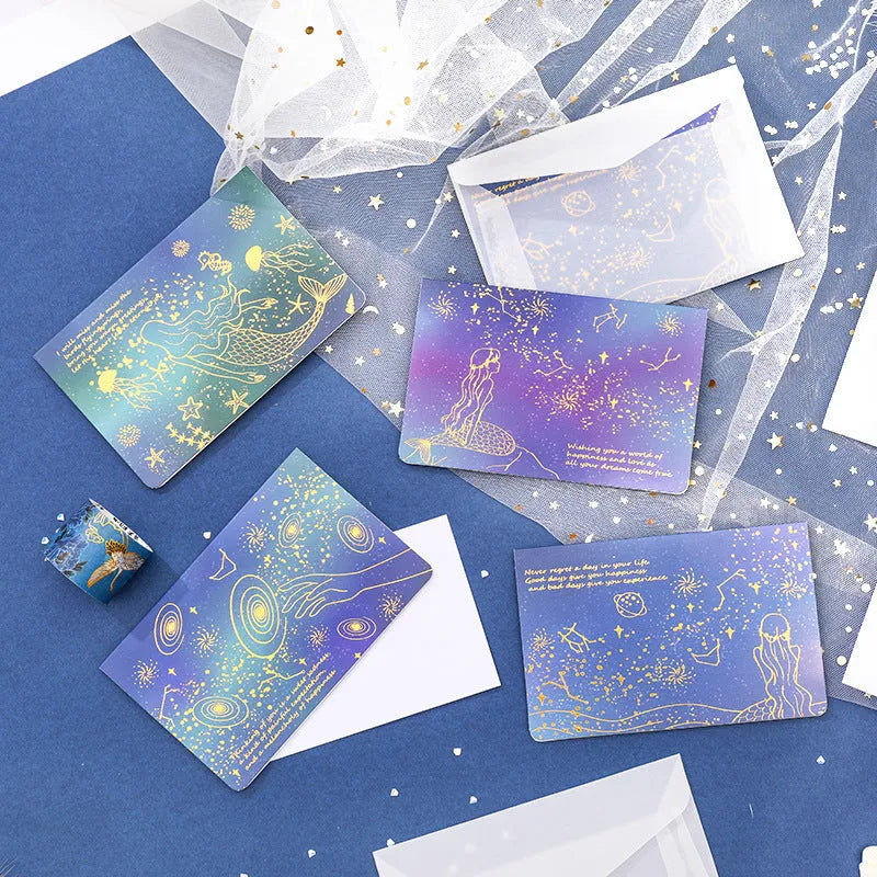 Set of three girly style bronzing mermaid greeting card envelopes on sulfuric acid paper.