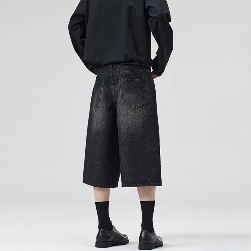 Men's cropped denim shorts in light blue with straight-leg design and five-pocket configuration