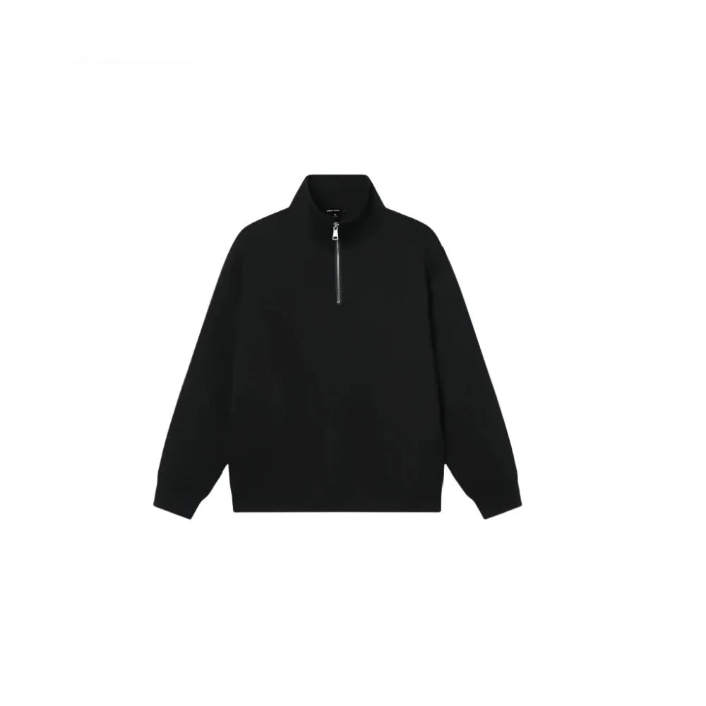 Half-zipped grey cotton sweatshirt with stand collar, long sleeves, and casual grunge style texture