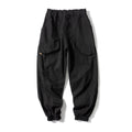 Cotton casual trousers with large side pockets and tapered legs in black colour