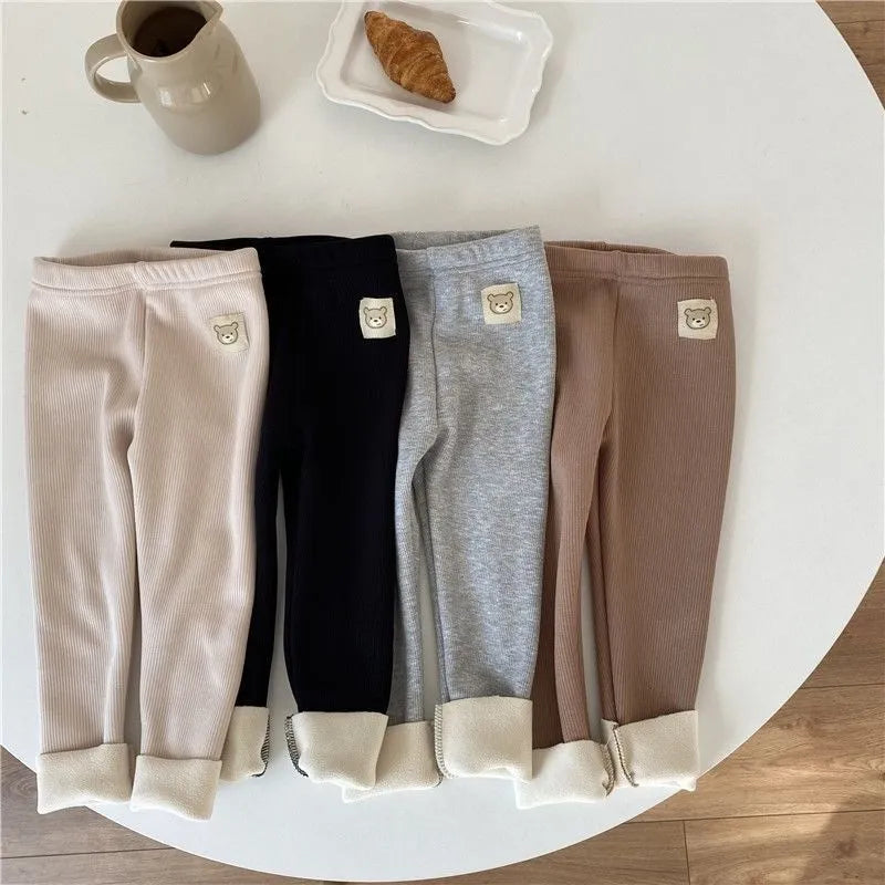 Girls' high-waist fleece-lined leggings in beige, black, brown, or grey colour.